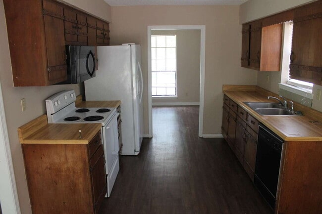 Photo - This well-maintained 3-bedroom, 2-bathroom home offers a comfortable and functional layout perfec...