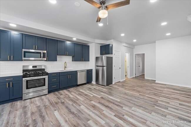 Building Photo - 7320 N Rogers Ave Unit ON Rental