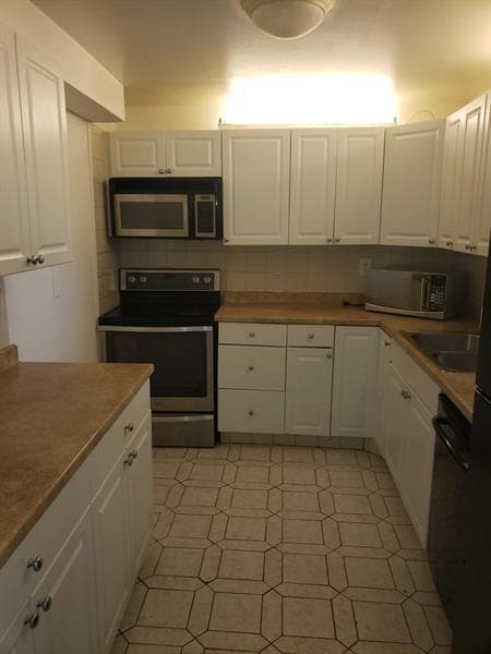 Building Photo - 4364 NW 9th Ave Unit 16-3E Rental
