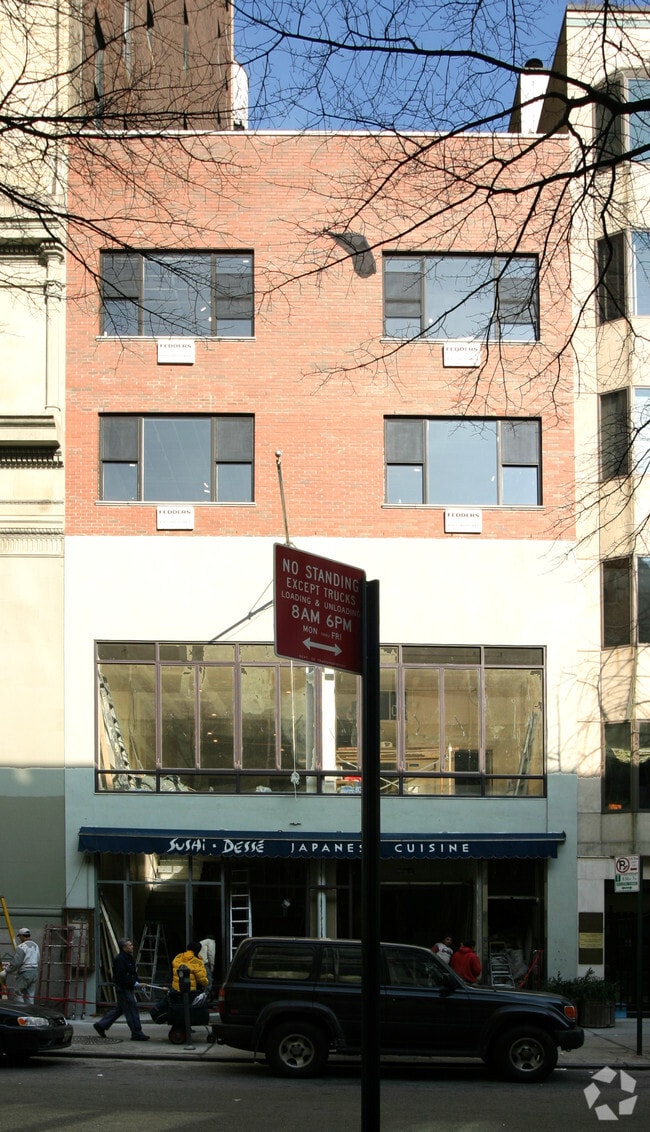 Photo - 113-115 E 18th St Apartments