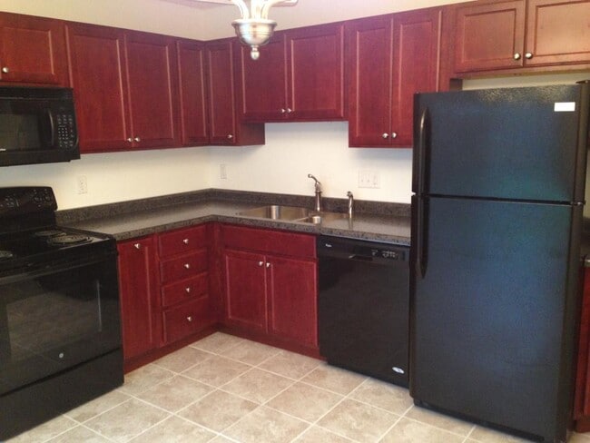 Building Photo - 3111 Elmhurst Dr Unit 1