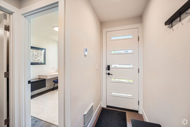 Building Photo - Modern stylings and cutting-edge convenien... Rental