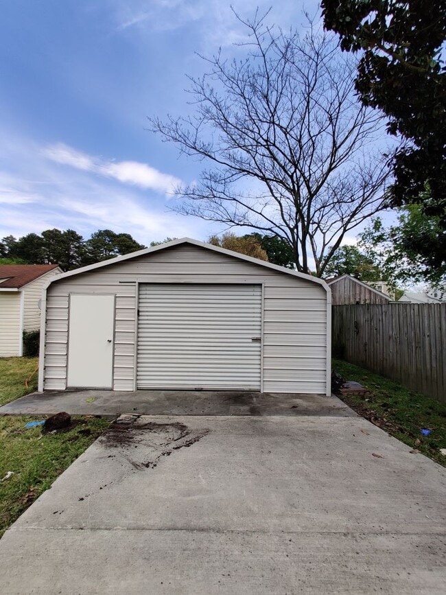 Photo - 2 bedroom home with a garage