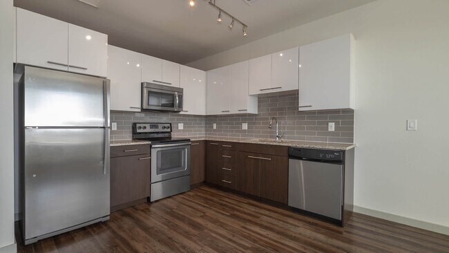 Kitchen with Stainless Steel Appliances - Milehouse