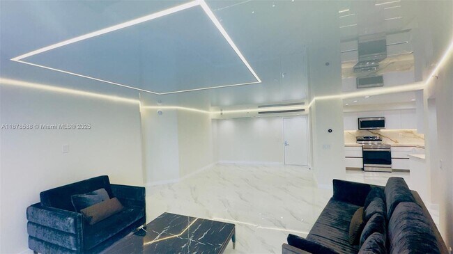Building Photo - 3500 Mystic Pointe Dr Unit 1107 Rental