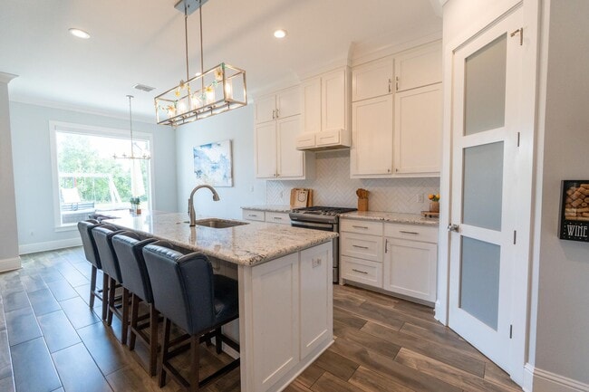 Photo - Waterfront Dream in Island Park | 4BR Retreat with Fire Pit, Flex Space & Backyard Oasis