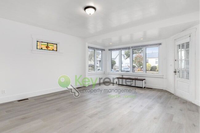 Photo - $1000 Off First Month! Spacious 3-Bed, 2-B...