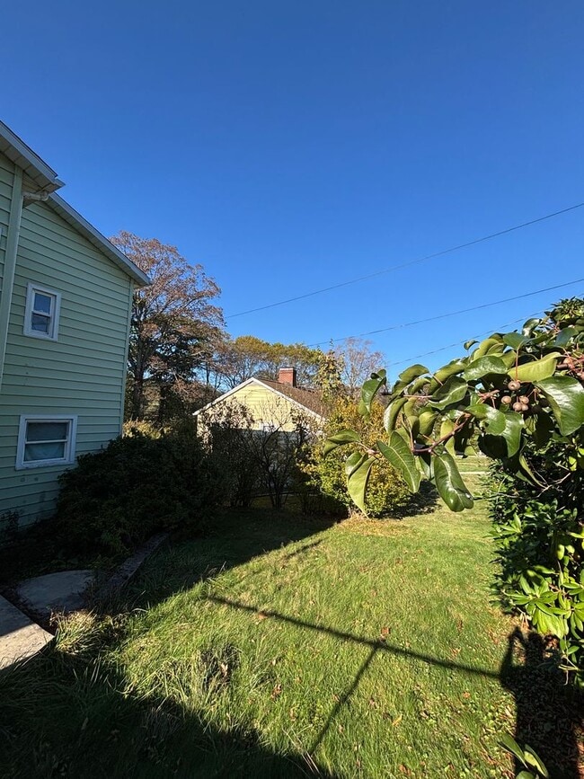 Photo - Charming 2-Bedroom Single-Family Home with Garage and Off-Street Parking