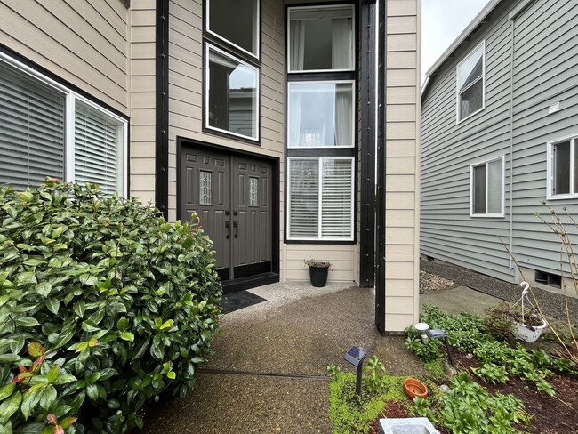 Photo - Grand 5 Bedroom Home Featuring 19ft Ceilings, Family Room & Main-Level Suite