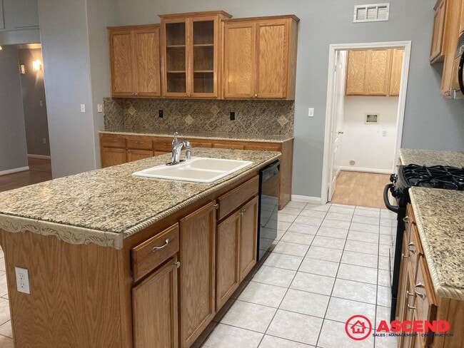 Photo - Spacious 4 Bedroom + Office Home with Gated Pool & 3-Car Garage