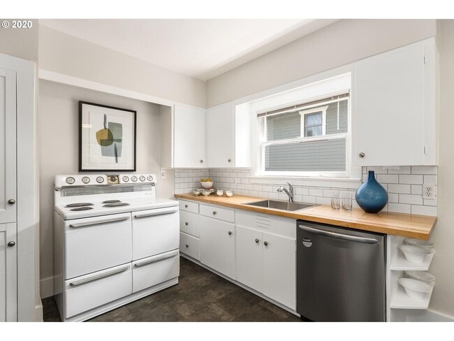 Photo - Charming 2-Bedroom Gem with Spacious Living Room and Bright Open Kitchen!
