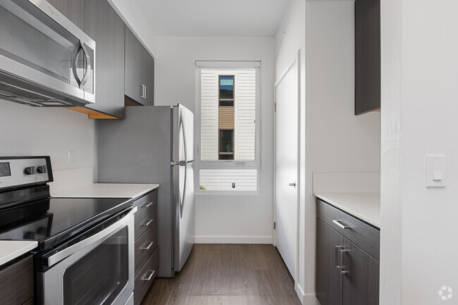 open kitchen with window - 17th Place Townhomes