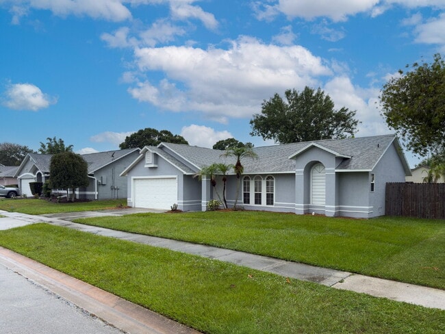 Photo - Spacious 3/2 with split plan and large fenced yard!