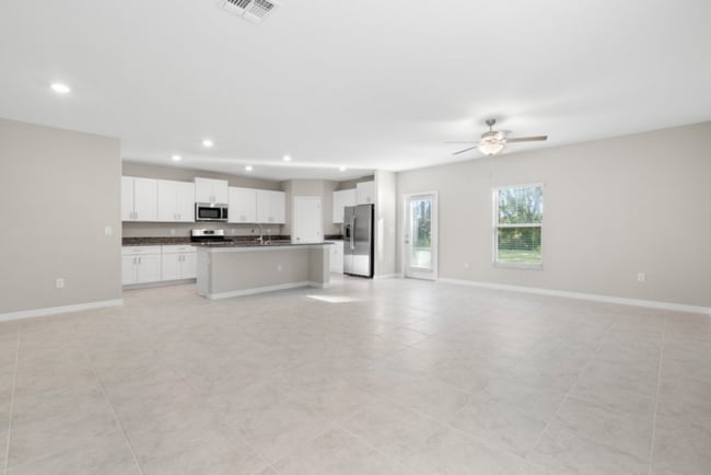 Photo - "Spacious 5-Bedroom Retreat in Apollo Beach - Modern Living with 2.5 Baths on White Chicory Dr!"