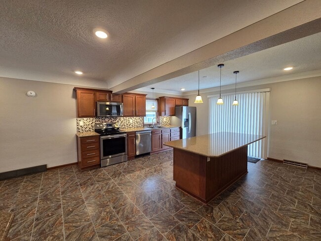 Building Photo - Well-Maintained 3BR Home – Garage + Washer/Dryer, dishwasher Included