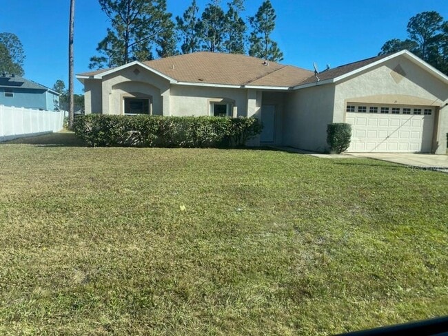 Building Photo - Newly renovated 3 bed, 2 bath home located minutes from Palm Coast dining, shopping, and the beach