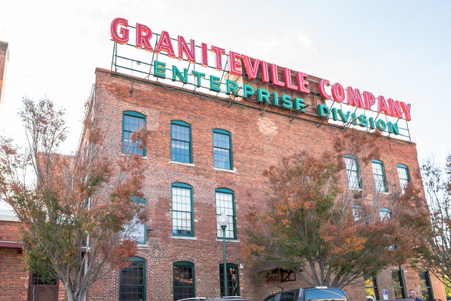 Neon Sign over Mill - Enterprise Mill Residential Apartments