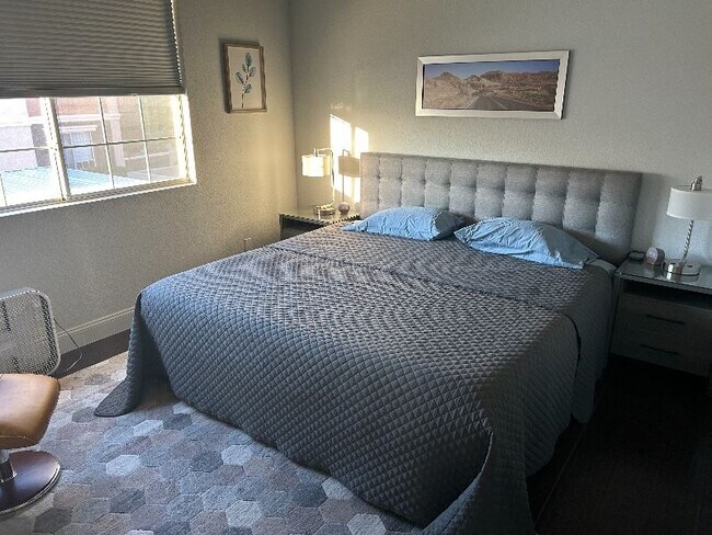 Primary bedroom (king bed). - 7712 Himalayas Ave Unit 202