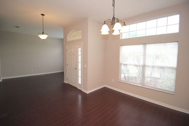 Photo - Huge 4 Bed 3 Bath Home w FENCED YARD and SCREENED LANAI for Rent!