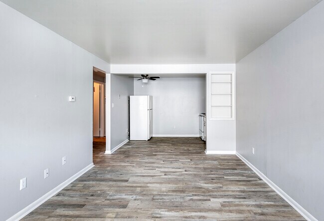 Living Room/ Kitchen - Riverview Place Apartments
