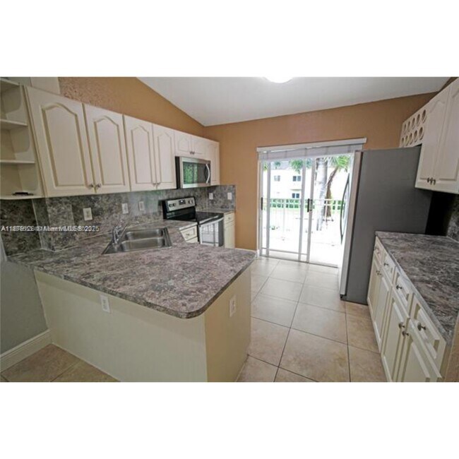 Photo - 10953 W Okeechobee Rd