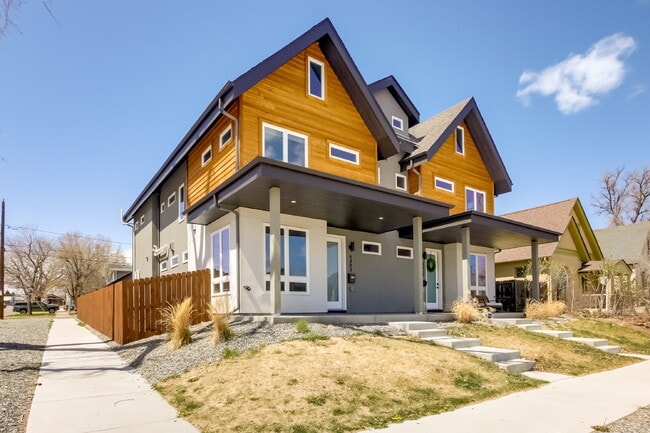 Building Photo - Spacious and Elegant 4-Bedroom Home in the Highlands w/ 3rd Floor Balcony!