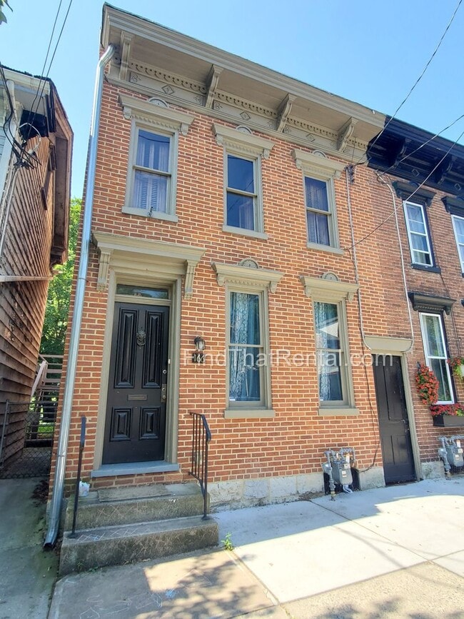 Building Photo - Charming Historic Retreat with Private Fenced Yard & Parking – Prime Downtown Location