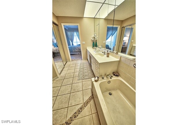 Photo - 265 Barefoot Beach Blvd Unit 204