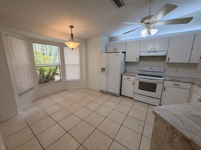 Photo - Centrally located 3/2 with 2 car garage. Pet friendly with fenced in backyard. Lawncare included.