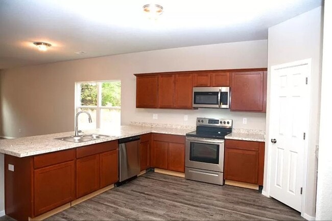 Photo - 4-Bedroom, 2-Bathroom West Fayetteville Home with fenced in backyard and 2x car garage - Availabl...