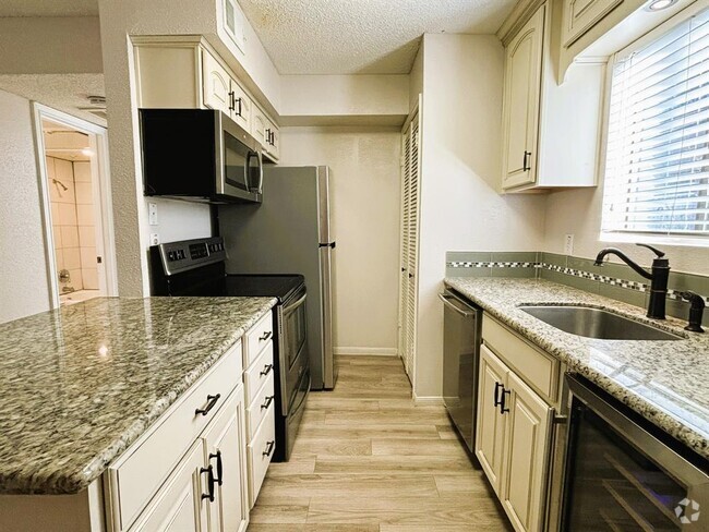 Building Photo - 12100 Melville Dr Unit 202B Rental