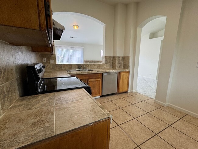 Photo - Three Bed, Two Bath Home with Two Car Garage