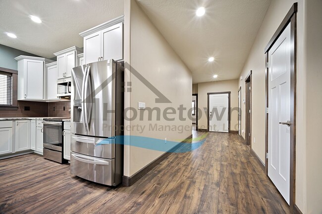 Photo - 3 Bedroom 2 Bathroom Home with Attached 3 Car Garage Available in Coeur d'Alene!