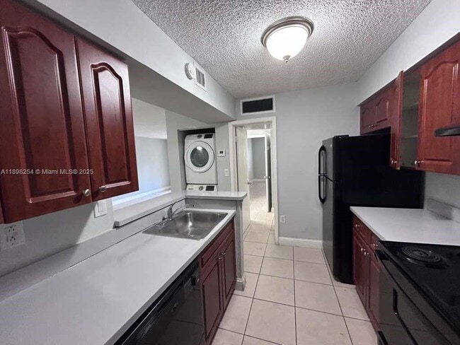 Building Photo - 15201 SW 80th St Unit 312