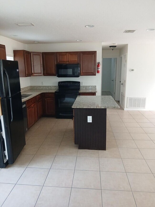 Photo - Remodeled, 4 Bedroom, 2 Bathroom close to schools, shopping and highways ...