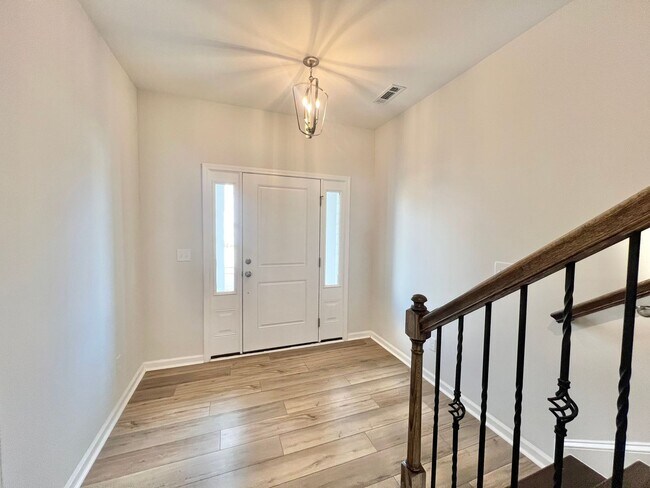 Photo - Stunning 4BD, 3.5BA Knightdale Townhome with a 2-Car Garage in an HOA Community