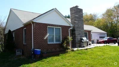 Building Photo - Nice Brick Ranch-Style House located acros...