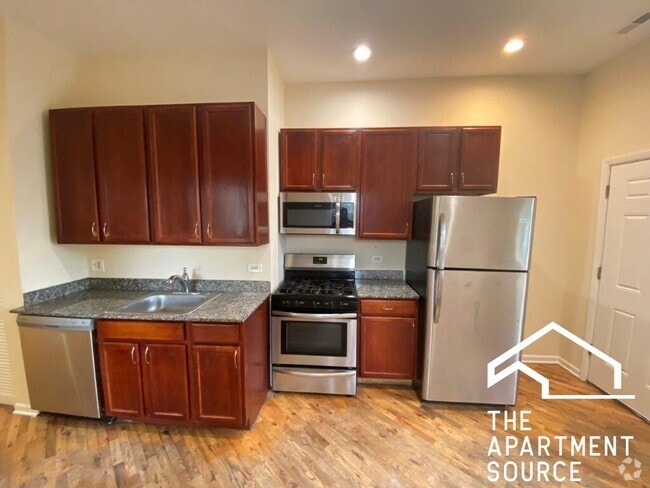 Building Photo - 2300 S Ridgeway Ave Unit 2N Rental