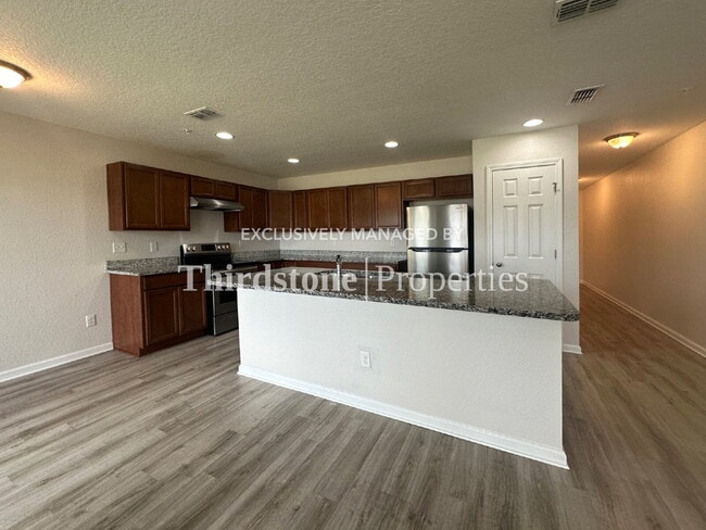 Photo - 9139 Western Way Unit 4