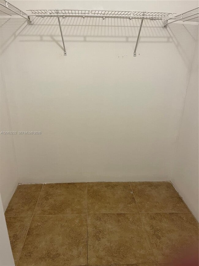 Photo - 9491 Palm Cir S Unit 203