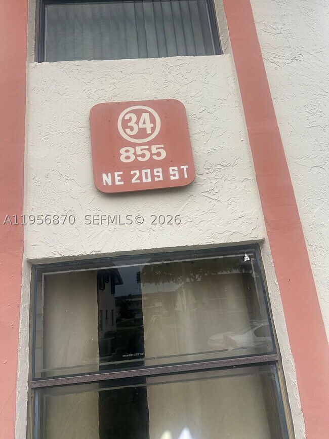Building Photo - 855 NE 209th St Unit 203-34