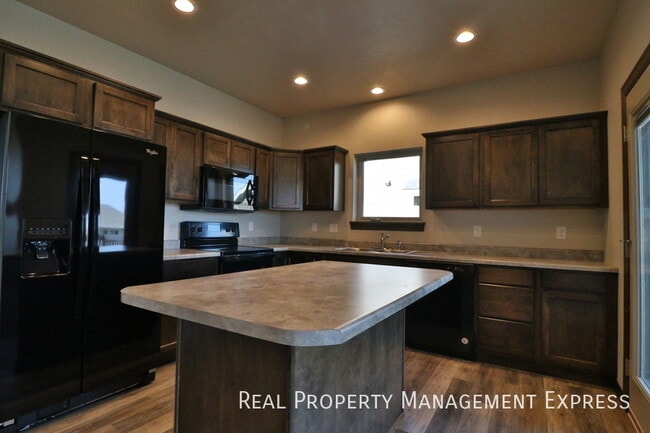 Photo - Beautiful 4 bedroom home with fenced in backyard!