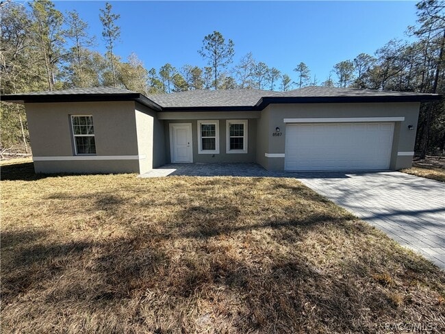 Building Photo - 8587 N Spikes Way