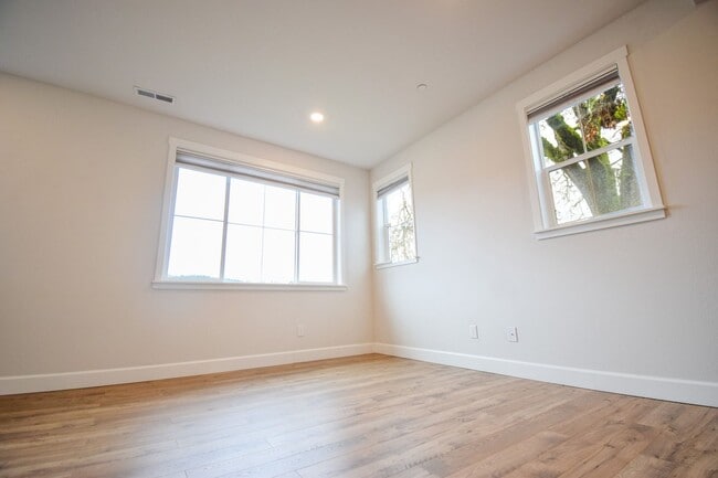 Photo - Beautiful 4 Bedroom 3.5 BA Home! Mother in Law Suite, Attached Garage & Top floor Bonus Room!