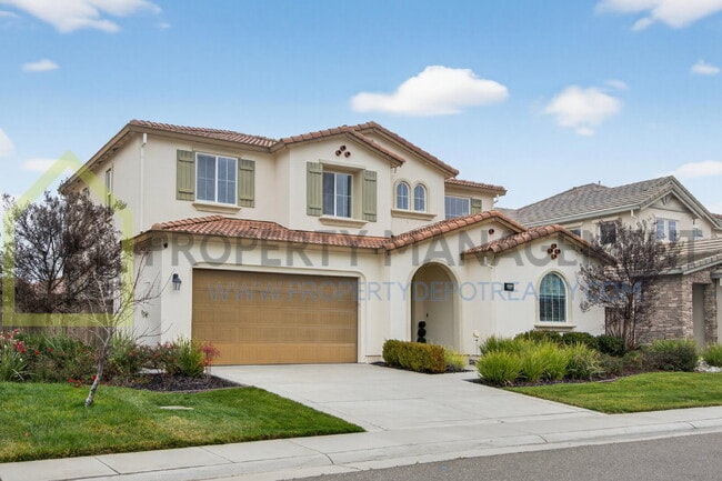 Photo - Spacious Elegance Awaits: 4-Bedroom Home with Hardwood Floors in Elk Grove!