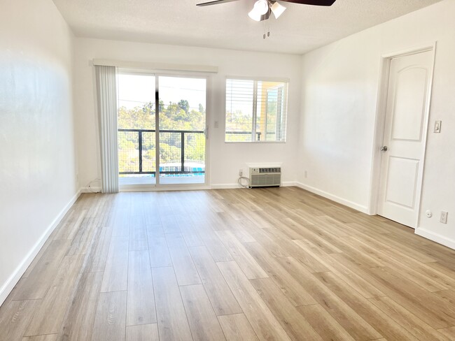 Living Room. - 1356 Douglas St Apartments