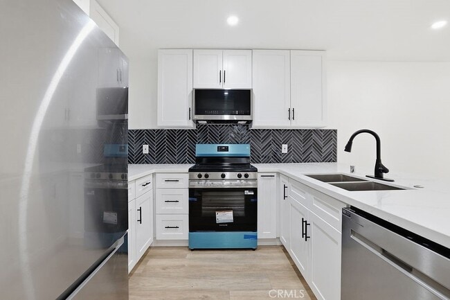 Building Photo - 17000 Burbank Blvd Unit 108