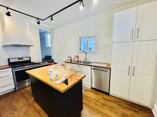 Photo - "Spacious 6-Bedroom Gem with Gleaming New Hardwood Floors in Minneapolis!"