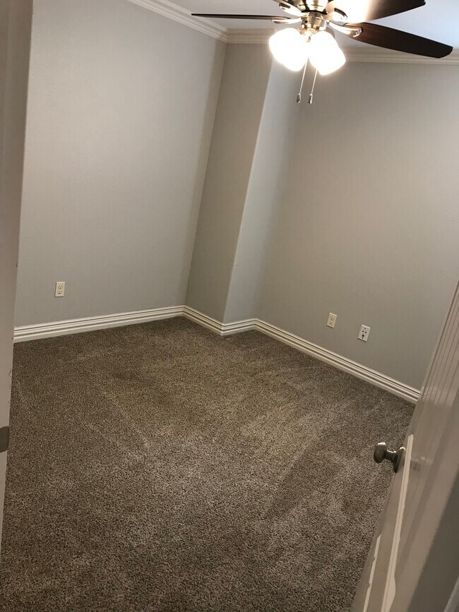 upstairs: bedroom #2 with closet - 606 South A Ave. Townhome