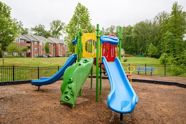 Let imaginations run free at our colorful playground—an inviting space for fun, adventure, and active play. - Timberland Park